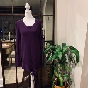 Long ribbed, sweater with tie at left front bottom.  Great for leggings.